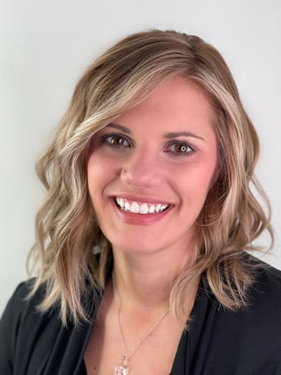 Wavy layers on shoulder-length hair by Pooran at Poza salon, Myers Park, Charlotte, NC